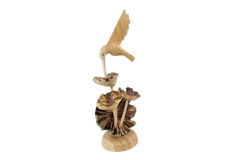 Wooden Hummingbird Feeding on Flower