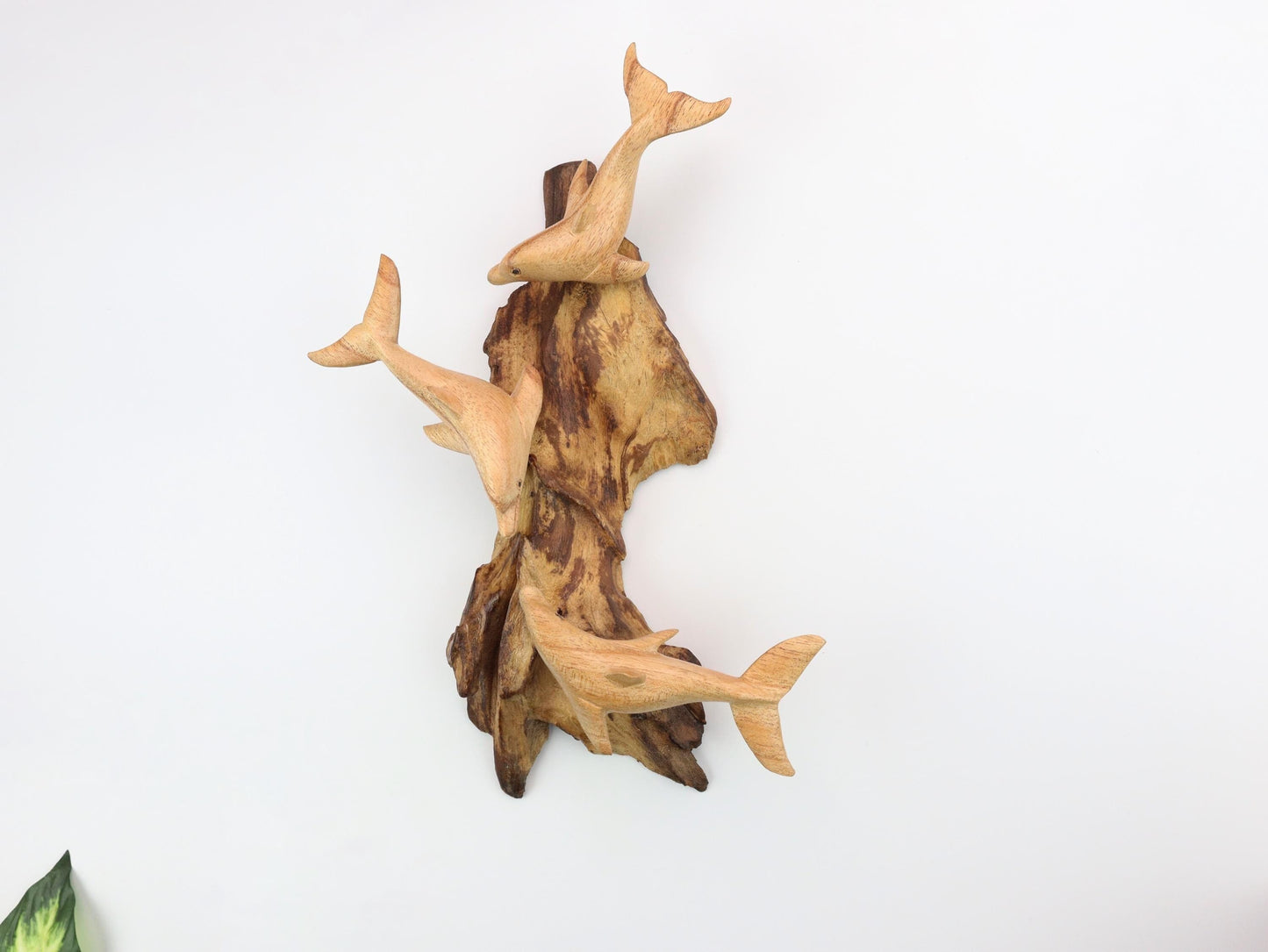 Hand-Carved Wooden Dolphin Trio Wall Art on Driftwood - Rustic Coastal Decor