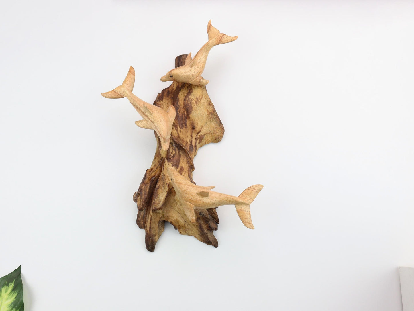 Hand-Carved Wooden Dolphin Trio Wall Art on Driftwood - Rustic Coastal Decor