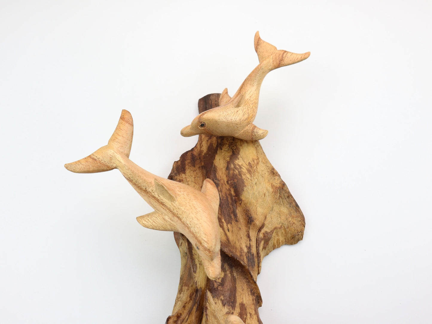 Hand-Carved Wooden Dolphin Trio Wall Art on Driftwood - Rustic Coastal Decor