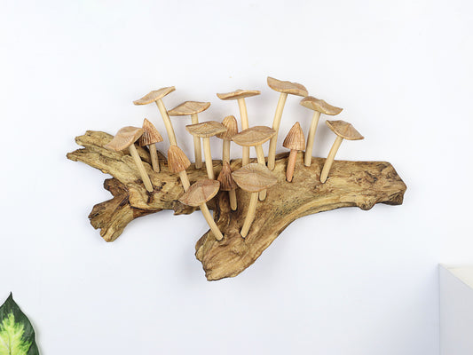 Large hand-carved natural wooden sculpture featuring multiple detailed mushrooms growing horizontally on a wide, textured wood log or root, rustic woodland decor.