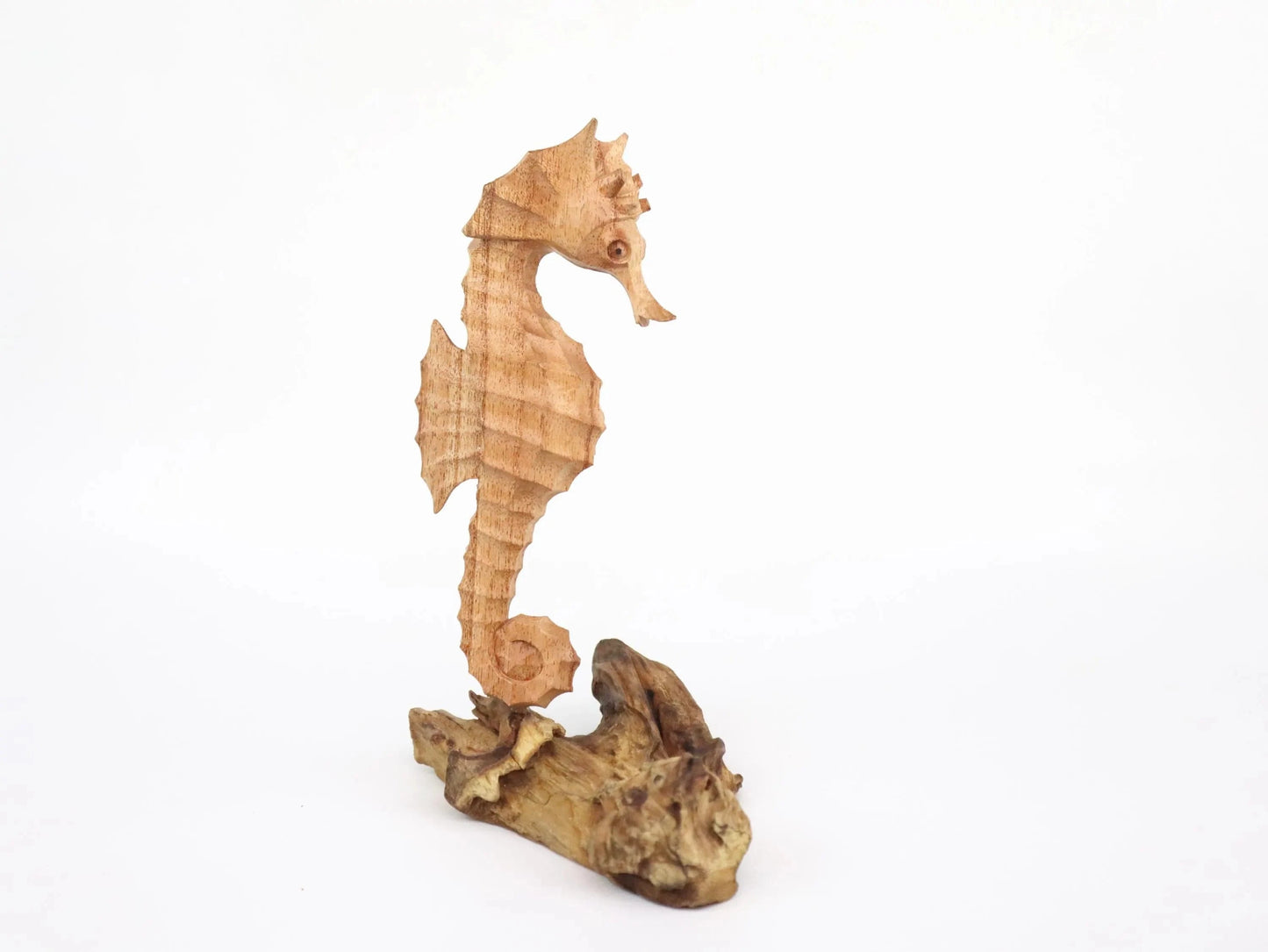 Hand-Carved Wooden Seahorse Sculpture on Natural Wood - Rustic Coastal Decor
