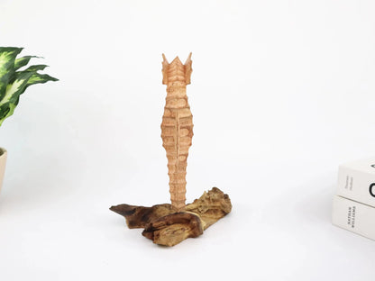 Hand-Carved Wooden Seahorse Sculpture on Natural Wood - Rustic Coastal Decor