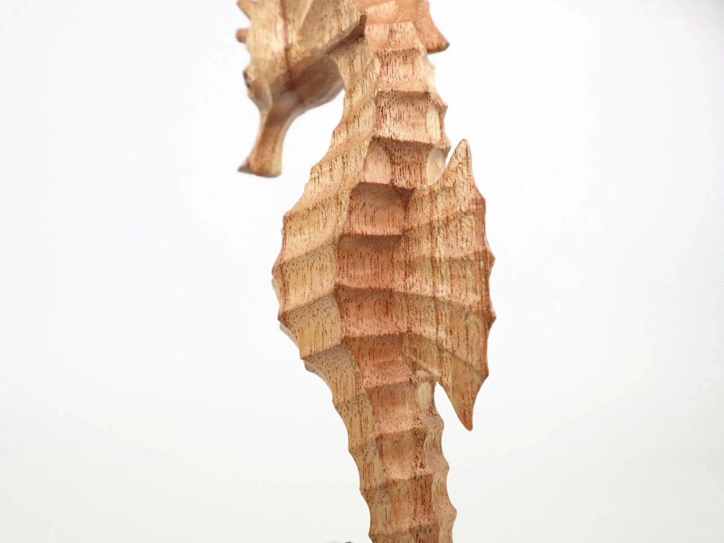 Hand-Carved Wooden Seahorse Sculpture on Natural Wood - Rustic Coastal Decor
